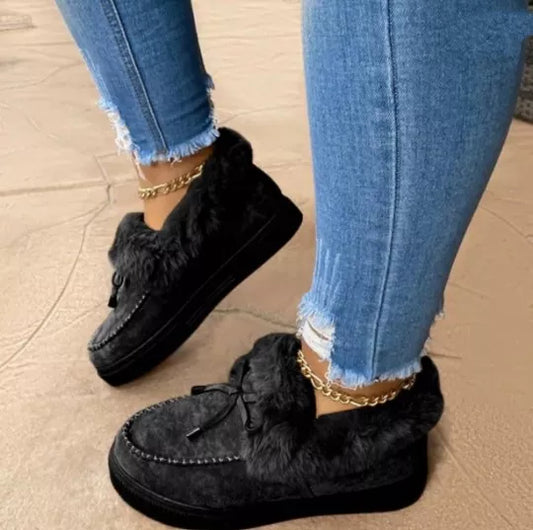 Black slip on shoe with fur